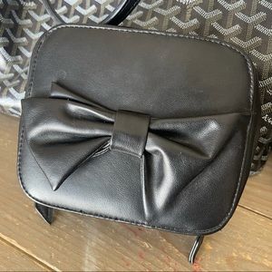 Trish McEvoy | black bow with red interior make up petite planner